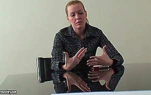 Cute blonde gives an interview in the room