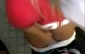 Blonde girl sucking cock at public toilet