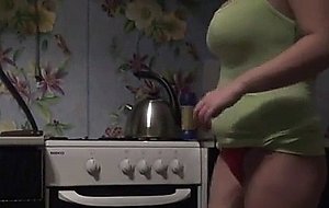 When she takes off her green dress, you will see h