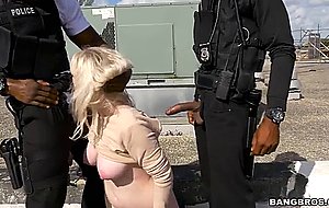 Kiki parker deepthroats two black cops on the rooftop