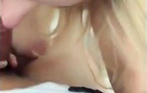 Young blonde taking a load of cum