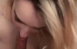 Young blonde taking a load of cum