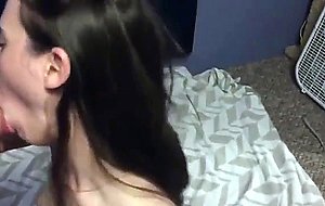 Young brunette girlfriend giving head