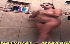 Very cute and Gorgeous College girl plays while Showering
