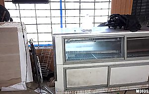 Greedy teen Audrey sucks in a warehouse for some cash