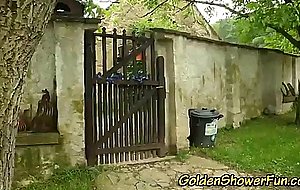 Outdoor threesome pissing and fucking