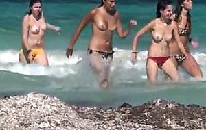 Girls coming out of the water
