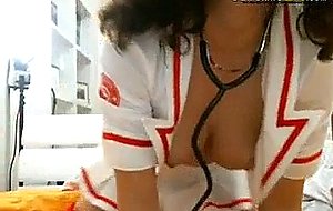 Brunette helloween nurse doing cam