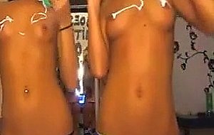 Two girls playing with webcam