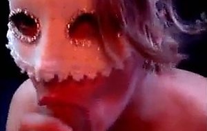 Busty masked housewife giving head