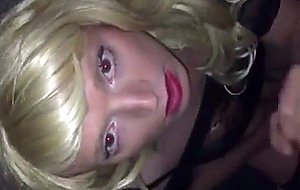 Pretty crossdresser sucks off her man