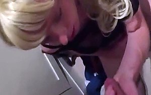 Pretty crossdresser sucks off her man