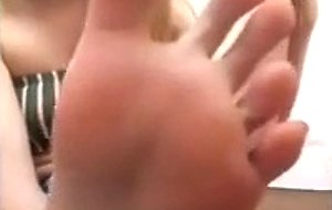 Amateur blonde teen worships her feet and licks her toes