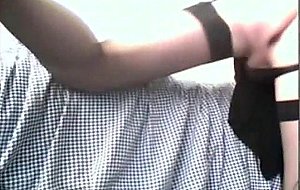 Crossdresser in purple inserts a giant vibrator