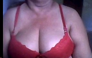 Brazilian granny shows her tits  