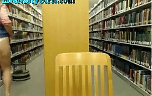 Webcam girl orgasms in library