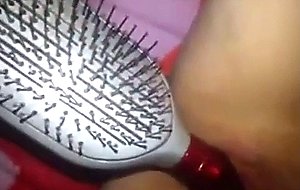 Nerdy amateur masturbates with hairbrush  