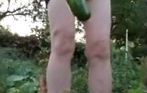 Playing in the garden and stuffing vegetables in my holes