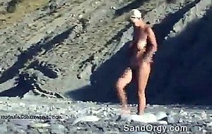Floppy tits pussy spying at naked beach