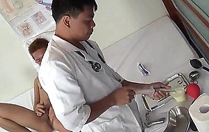 Close up gay asian medical asshole examination