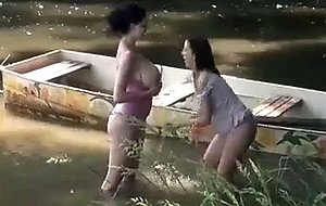 Lesbian fun at the riverside