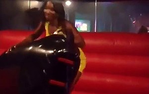 Black girl upskirt mechanical bull riding  
