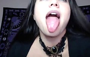 Playing with her humongous boobs on cam