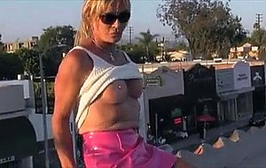 Smoking tranny show her cock outdoor