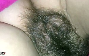 Spraying her hairy vagina with cum