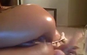 Oiled big tits babe rides a sex doll 