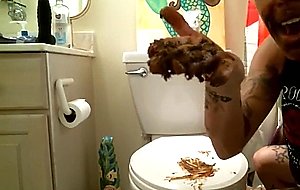 Tattooed blonde shitting and eating her shit