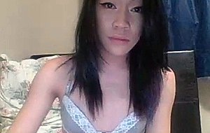Cutie asian ts cums on her small titties