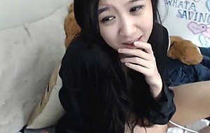 Sexy asian girl shows tits on cam  