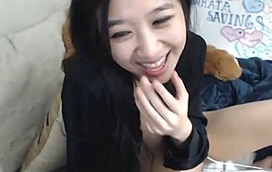 Sexy asian girl shows tits on cam  