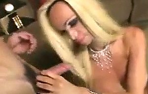 This busty blond tgirl makes chaps dick erect