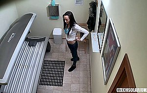 Sexy brunette babe caught in public solairum