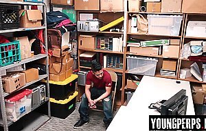 Loss Prevention officer kept an eye on the latino male