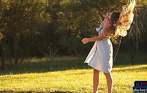 Petite MILF Lily Chey outdoor striptease and posing