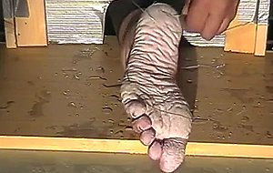 Tortured feet with wire  