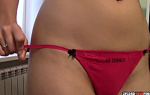 Gorgeous brunette teen does a striptease performance