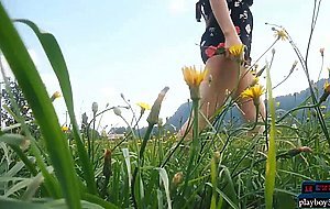 Natural MILF beauty enjoys the nature and flowers outdoor
