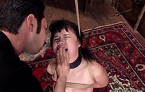 Gagged brunette slave is rough banged