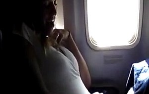 Masturbating her pussy in the airplane - free porn