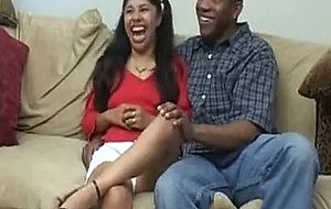 Black couple on couch blowjob