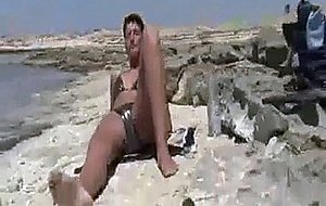 Shameless wife fist fucked at the beach