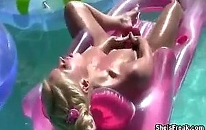 Blonde masturbating in pool
