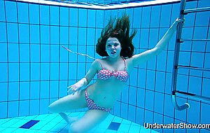 Sexy girl shows magnificent young body underwater