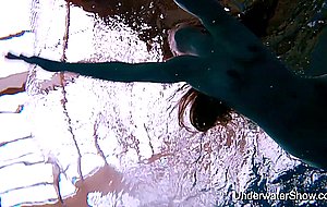 Sexy girl shows magnificent young body underwater