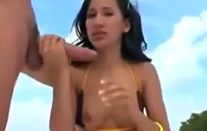 Petite brunette takes a huge cock