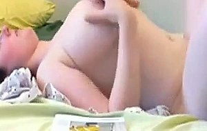 Pale brunette with big tits is reading & rubbing